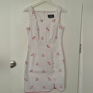 City Triangles White Mini Dress with Pink Floral Embroidery.